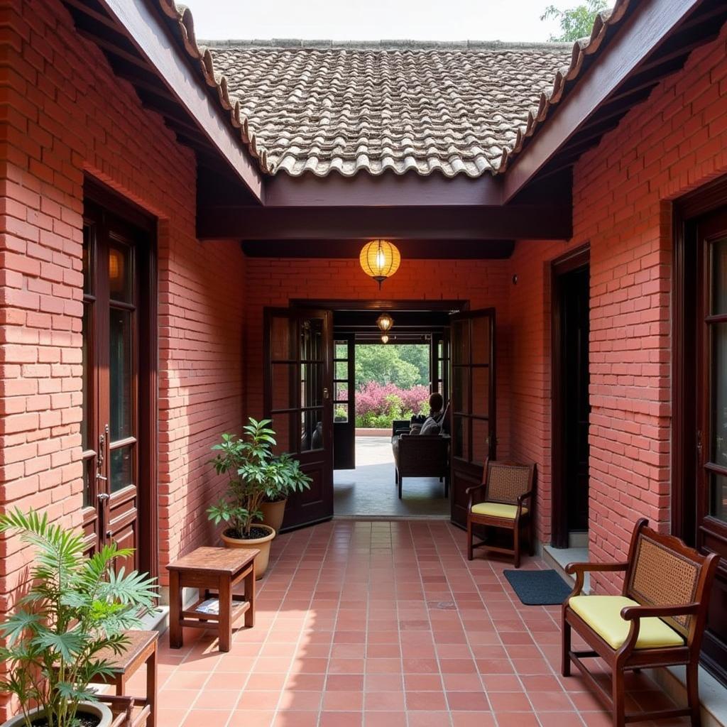 Homestay 1984 Rạch Giá được thiết kế theo phong cách kiến trúc cổ điển, với những bức tường gạch đỏ, mái ngói âm dương, khung cửa gỗ nâu sẫm.